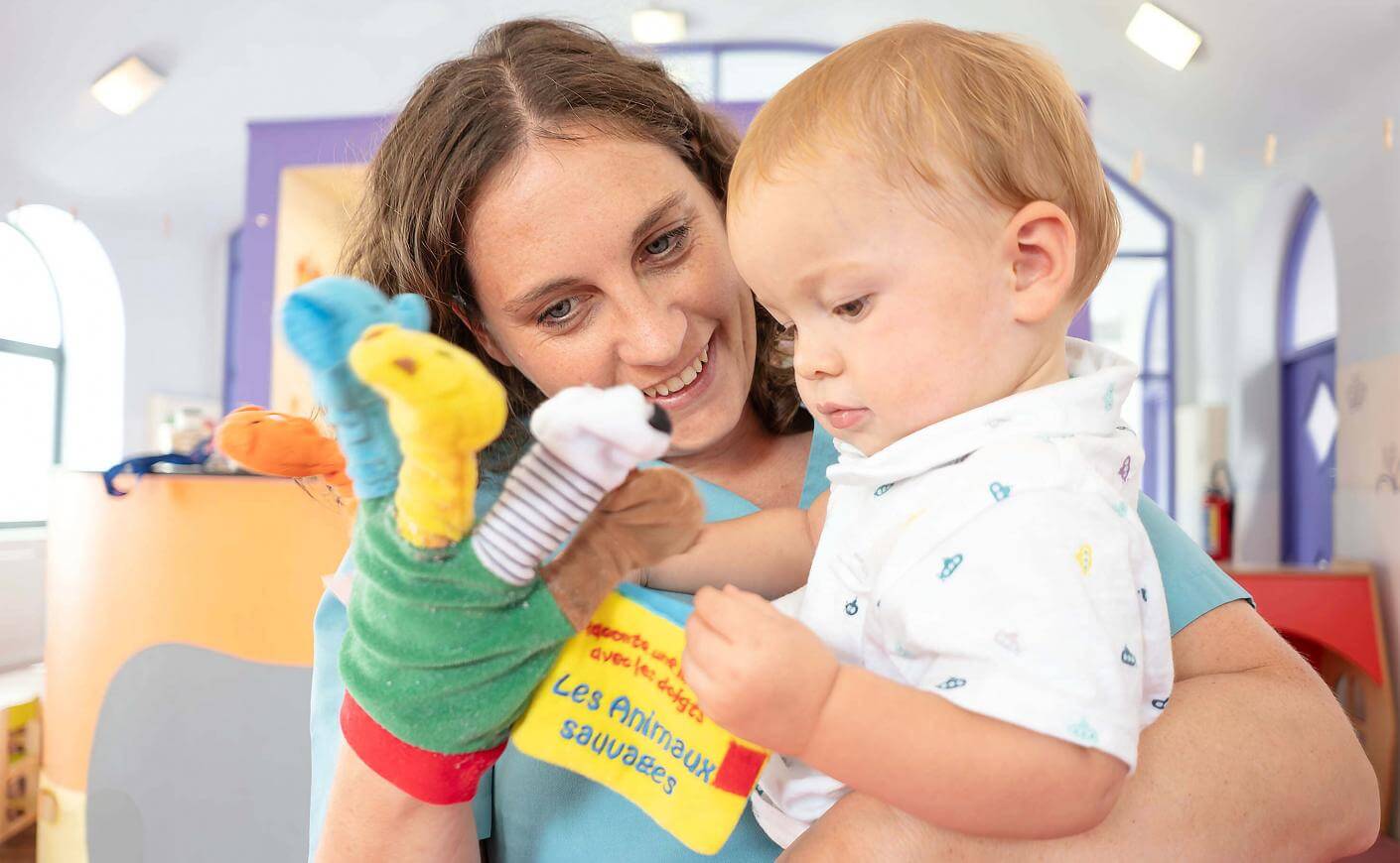 Photo puéricultrice avec un enfant